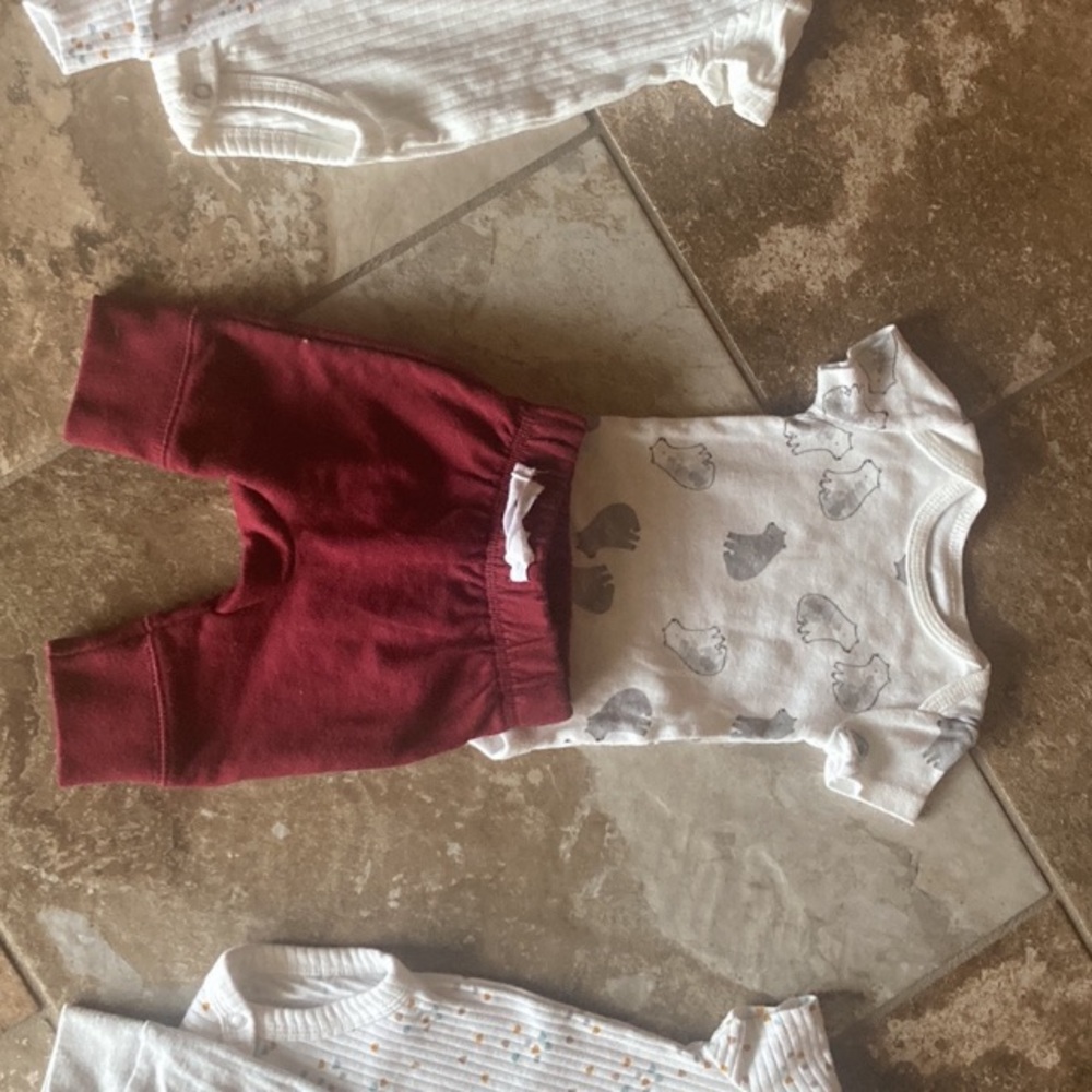 Newborn trio ; onesies with pants.